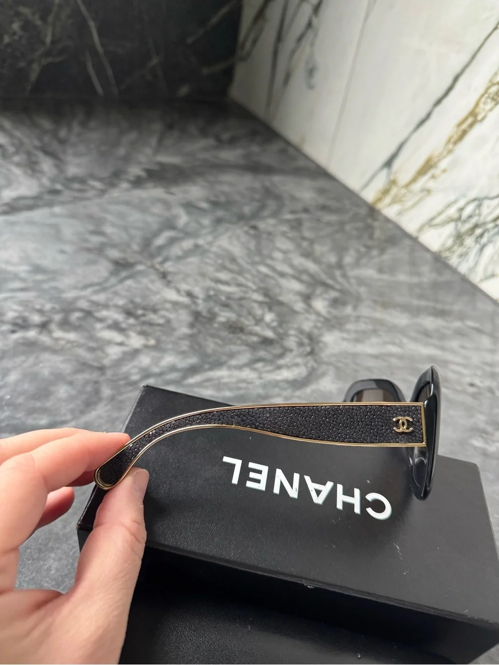 CHANEL Black Sunglasses with Gold Logo Accent